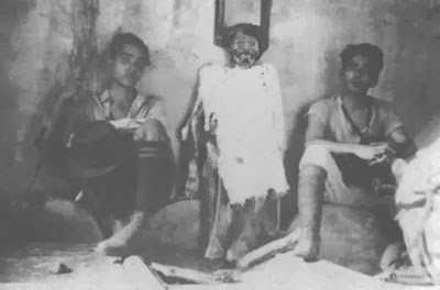Locals with a mummy created by Gottfried Knoche