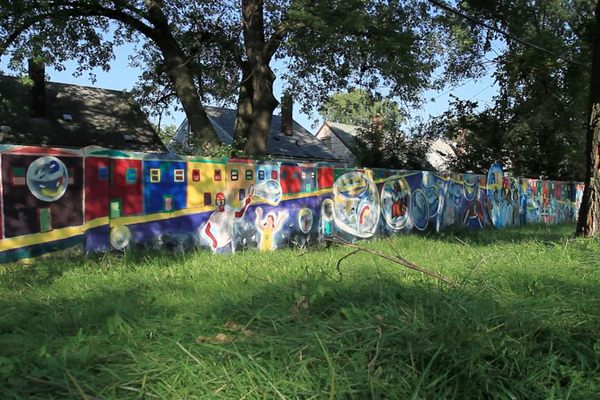 Mural alongside Alfonso Wells Memorial Playground