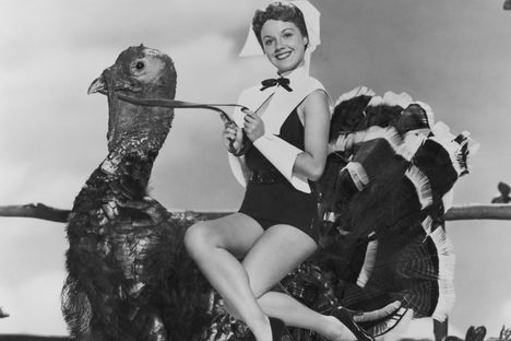 There are Puritans and then there are Puritans, like actress Virginia Gibson, photographed circa 1952, before almost all turkeys were white. 