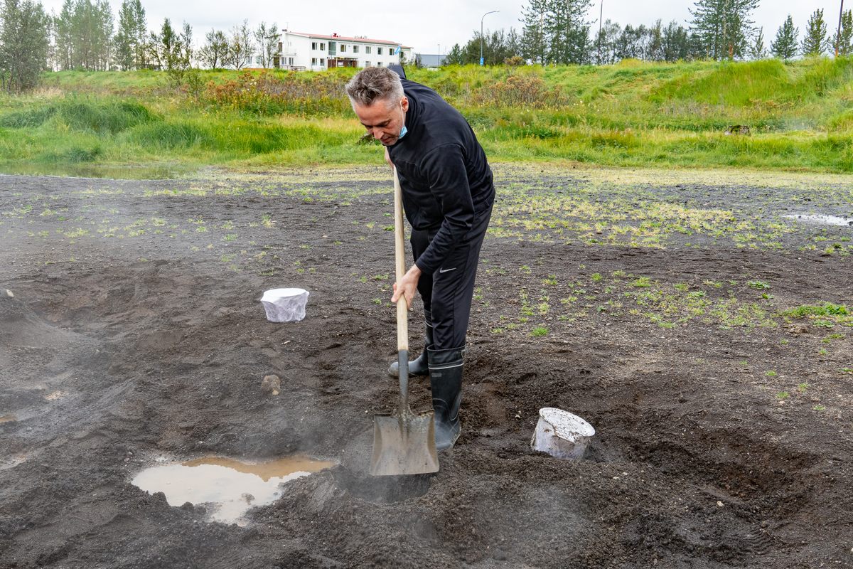 Digging up the pot of bread.