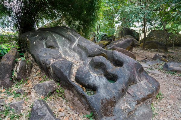 The Crocodile Stone at the ruins of Wat Phu.