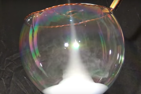 Watch a Smoke Tornado Swirl in a Soap Bubble