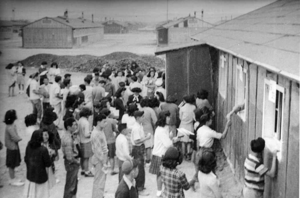 The <em>Ramblings</em> Yearbooks being issued at Topaz, 1945. 