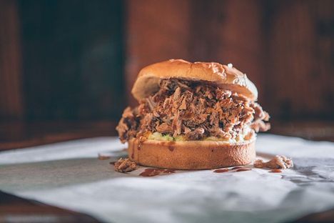 Skylight Inn BBQ sandwich close up.