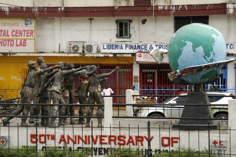 Artwork outside the entrance to the Liberian National Museum, commemorating the 50th anniversary of the Geneva Conventions.