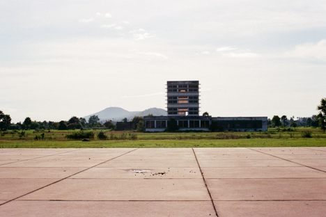 The control tower with the runway in the foreground.