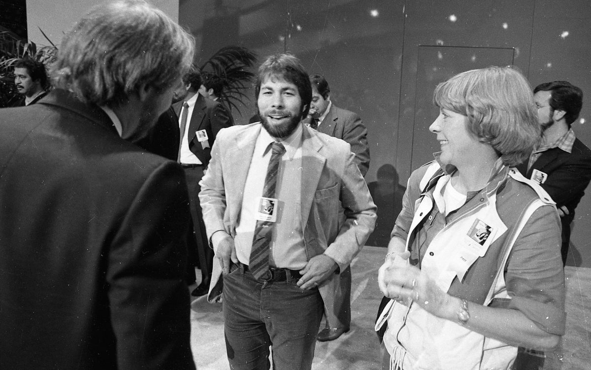 April 23, 1984: Steve Wozniak works the crowd after the Apple IIc was introduced at the "Apple II Forever" event at Moscone Center in San Francisco.