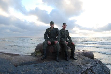Musuems guides on top of the bunker