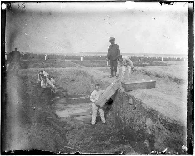 Jacob Riis' photograph of a trench at the potter's field on Hart Island, circa 1890