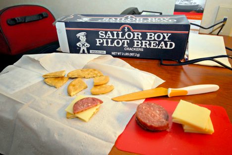 Cheese, meat, peanut butter, salmon spread, and even Crisco are favorite toppings on pilot bread.
