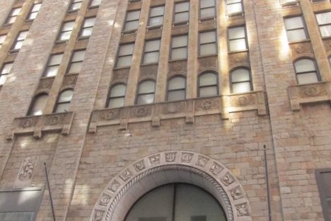 Detail on 74 Wall St. across the street