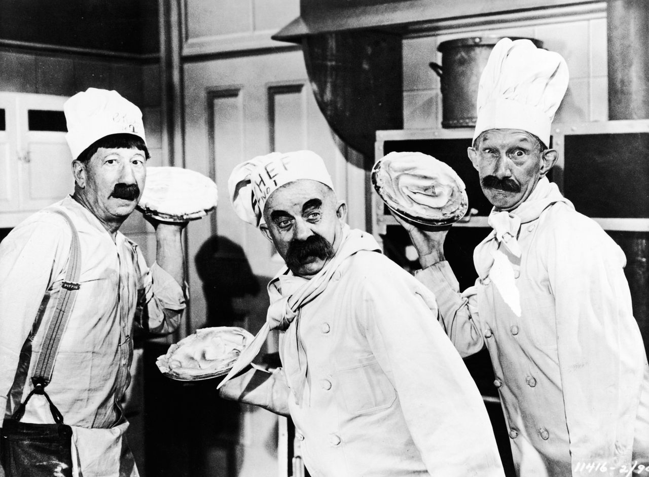 Three actors in use pie throwing for comedic effect in the 1947 flick 'The Perils of Pauline.'