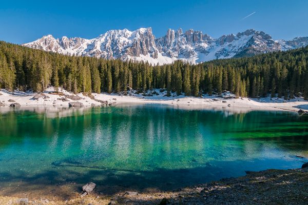 Carezza Lake at the foot of the Dolomites