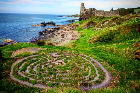The labyrinth, with castle ruins in the background.