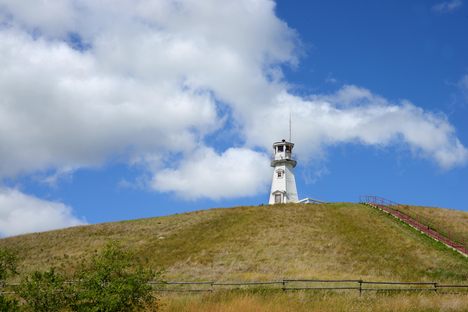 The lighthouse looks out over a sea of prairies.