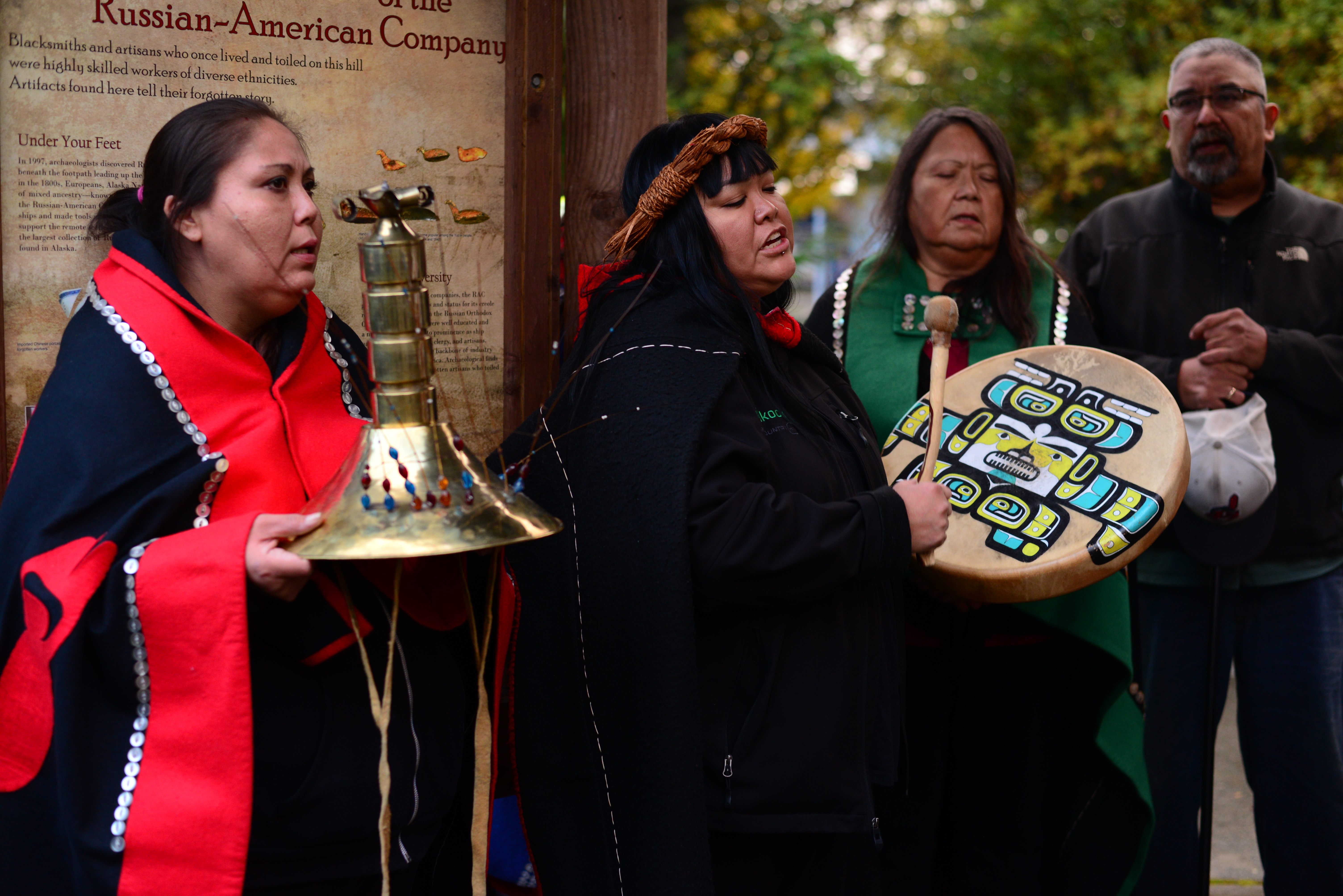 Dionne Brady-Howard, of the Kiks.ádi clan, leads a mourning song in a commemoration ceremony on October 15.