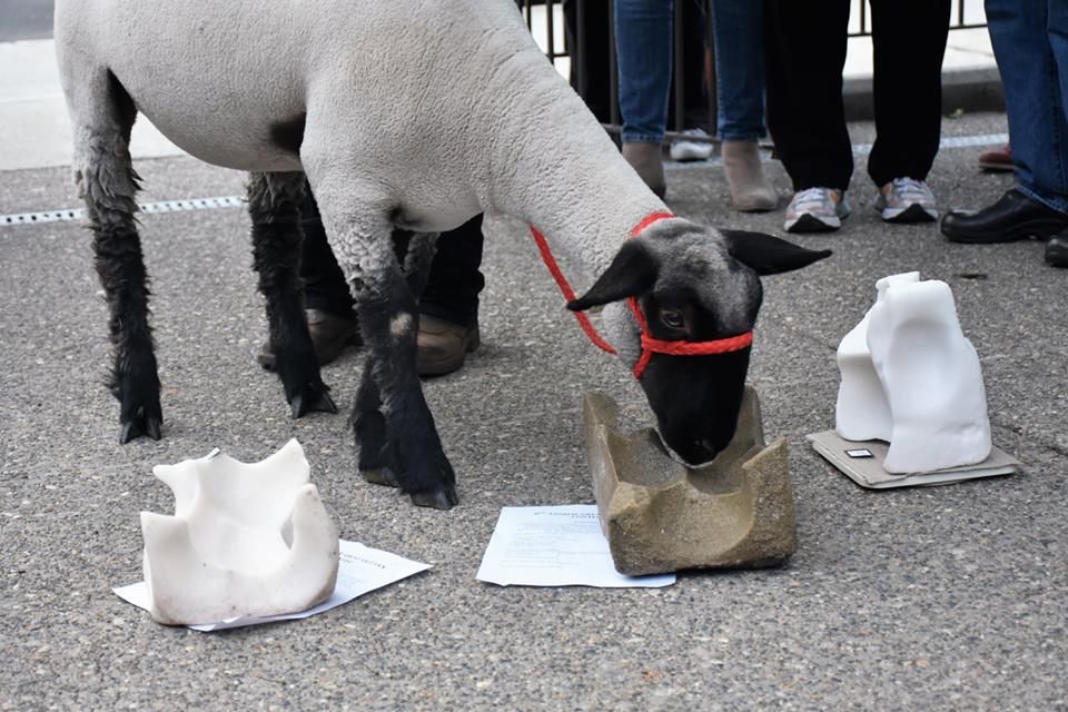 An artist puts some finishing touches on their entry.