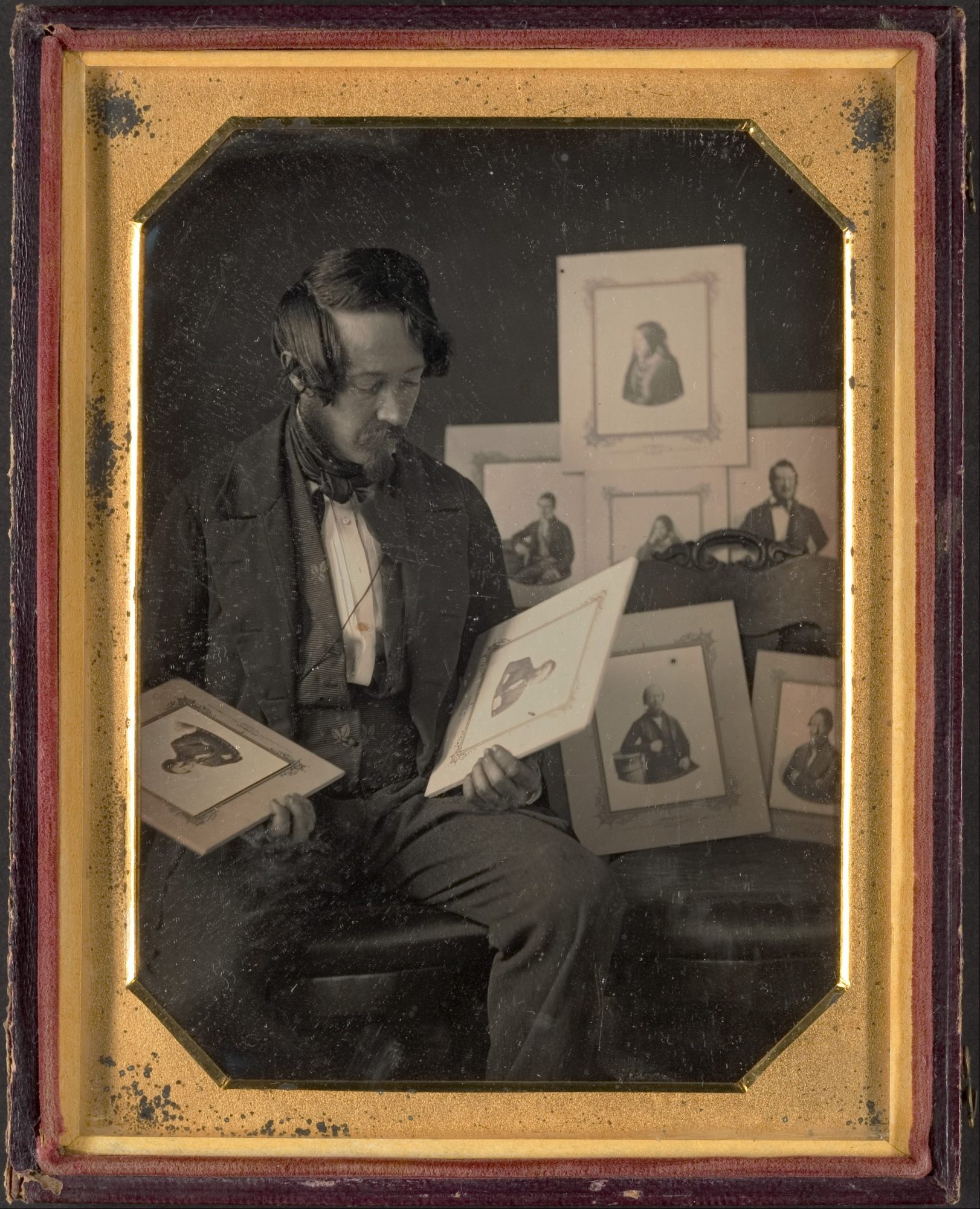 <em>Frederick Langenheim Looking at Talbotypes</em>, William Langenheim, c. 1849–1851.