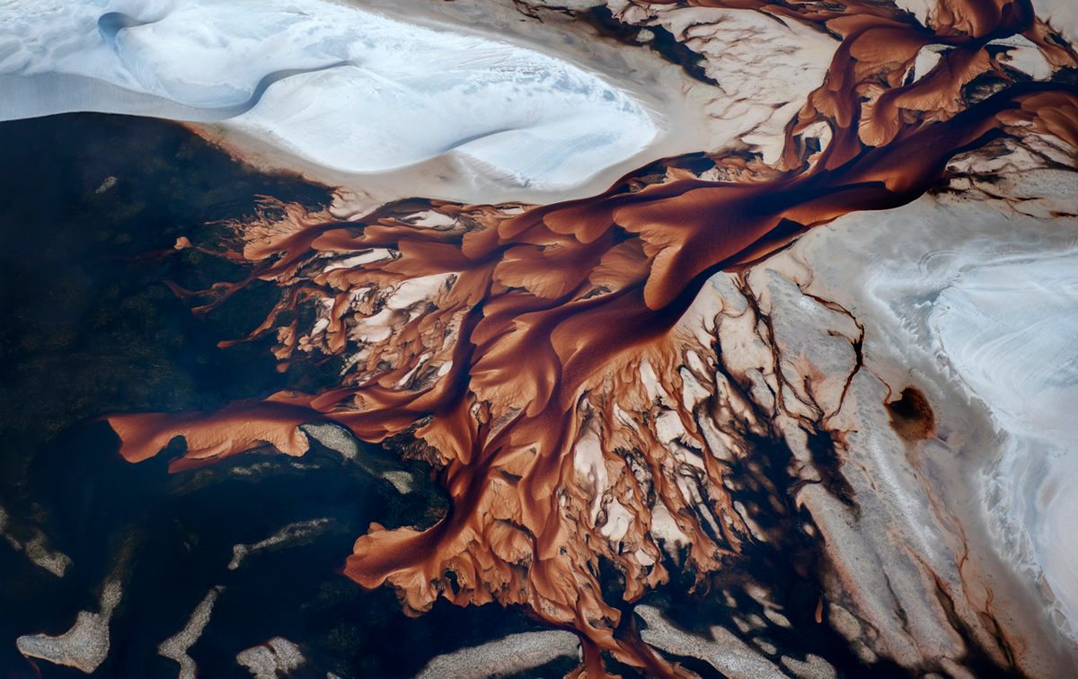 The Rio Negro splitting the dunes.