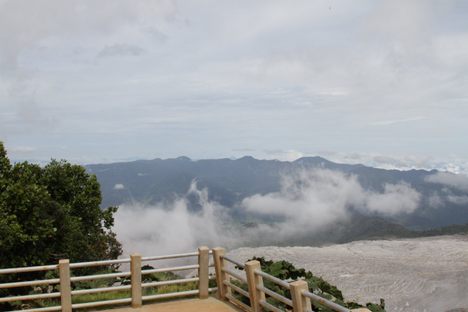 View from the Poás Volcano rim, Arenal Volcano can be seen on the far horizon 