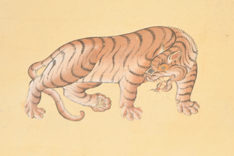 A tiger painted on a building in Thimphu; tigers are particularly revered in Bhutan.