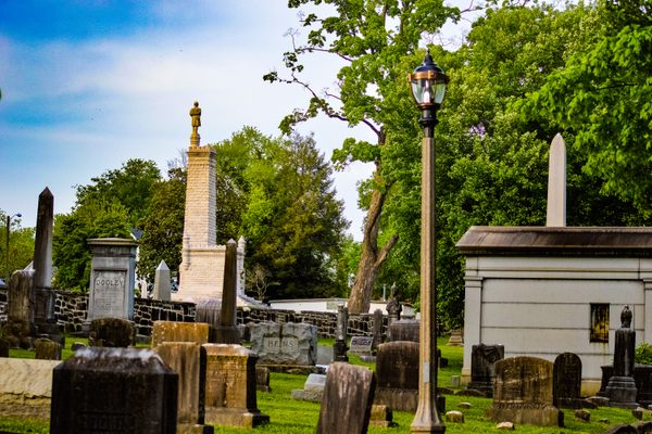 The Confederate soldier monument towers over an aging portion of Old Gray cemetery.