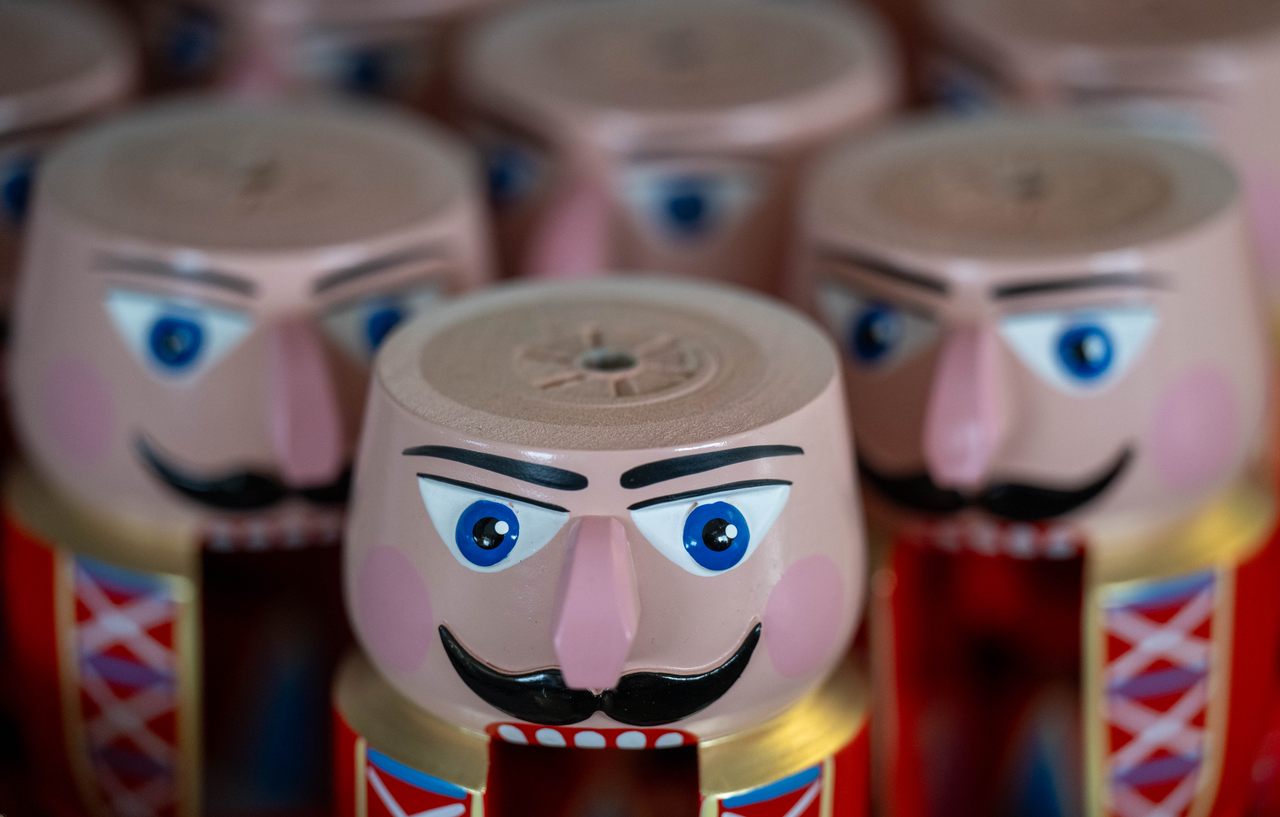 Traditional wooden nutcrackers await the finishing touches at the Füchtner family workshop in Germany, where the iconic style is said to have originated.