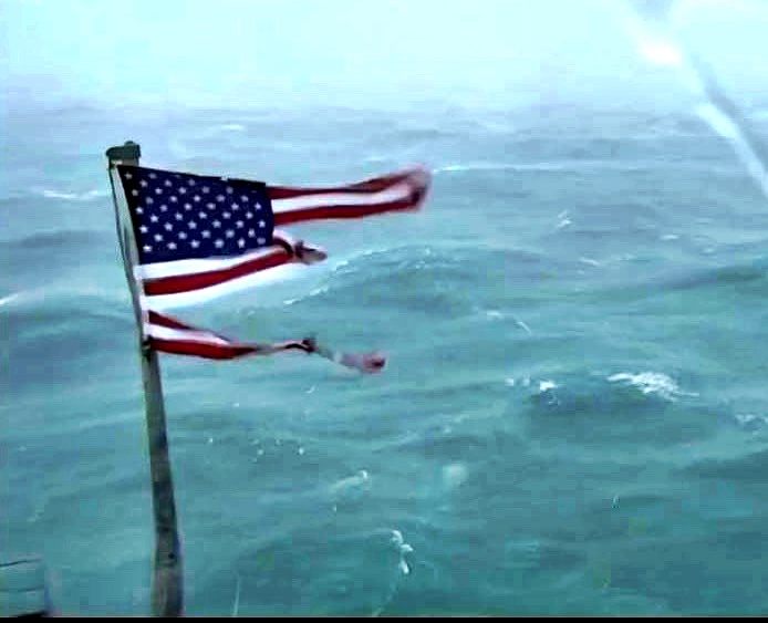 A camera caught the storm tearing through the flag in real-time, and the attention of thousands.