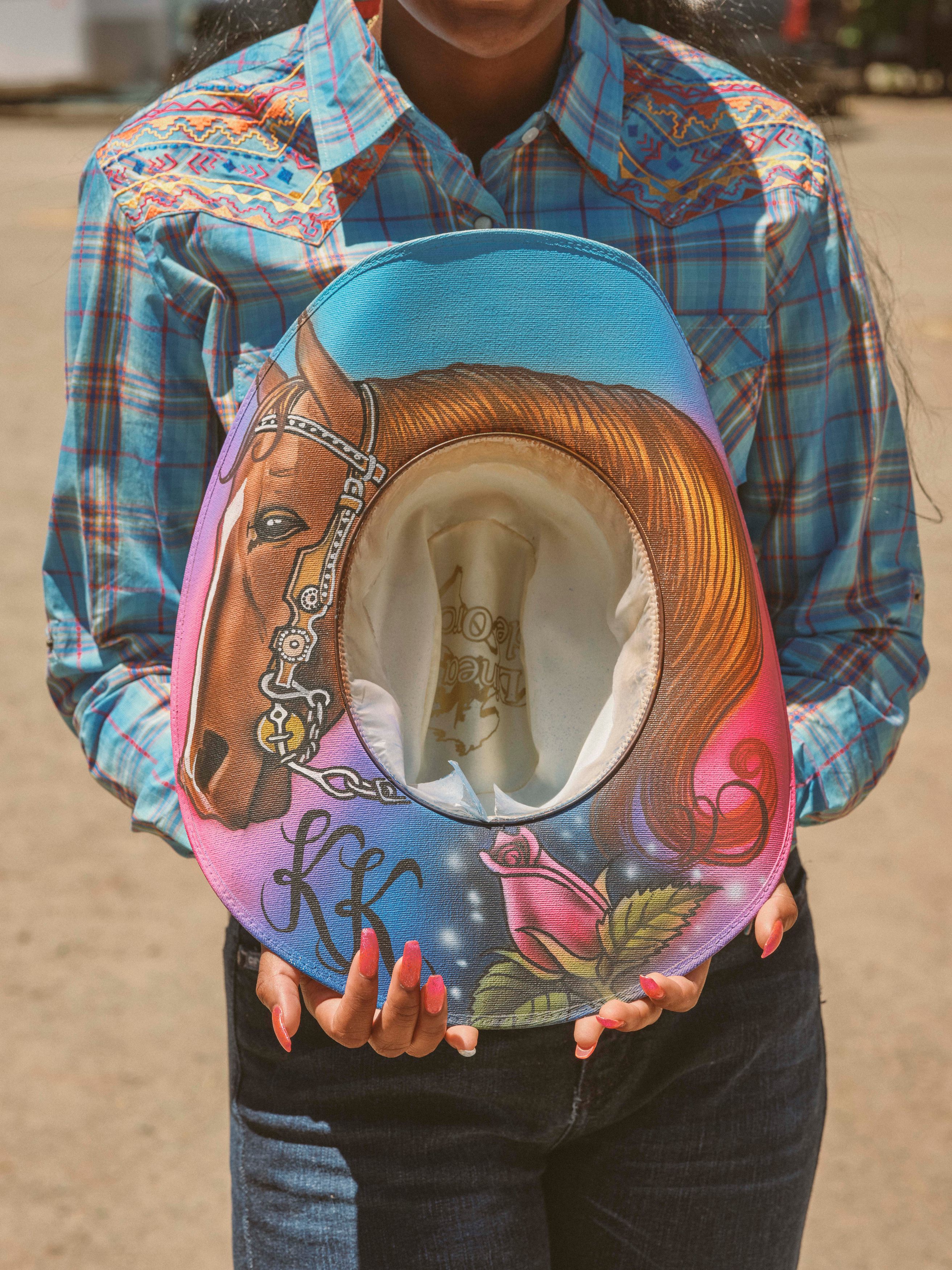 Barrel racer Kysariah Brinson's hat features a drawing of her horse, Chad, in 2019. “My mom actually drew Chad out and took the hat to a tattoo shop in downtown Oakland to get it airbrushed,” she said.