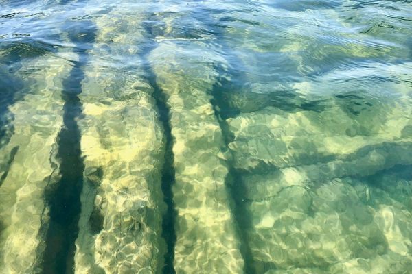 The wreck lies in shallow water.