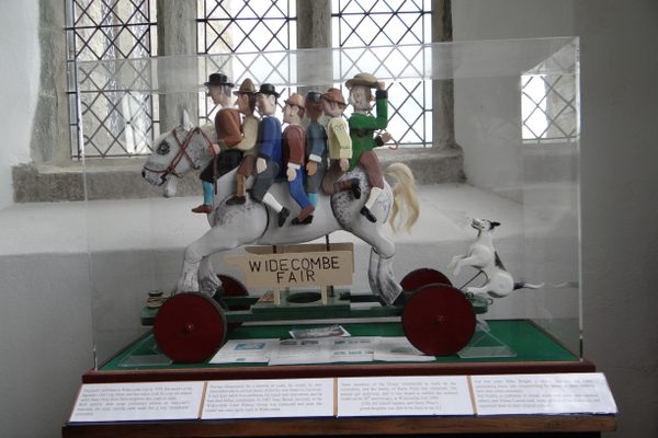 The gray horse and its riders.