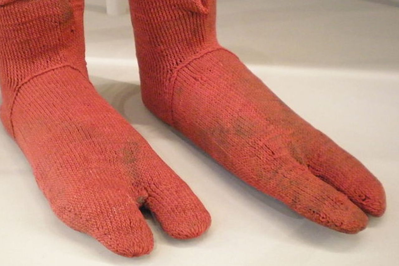These socks, made in Egypt in the fourth or fifth century and now in the Victoria and Albert Museum, are all the better for your sandals, my dear. 