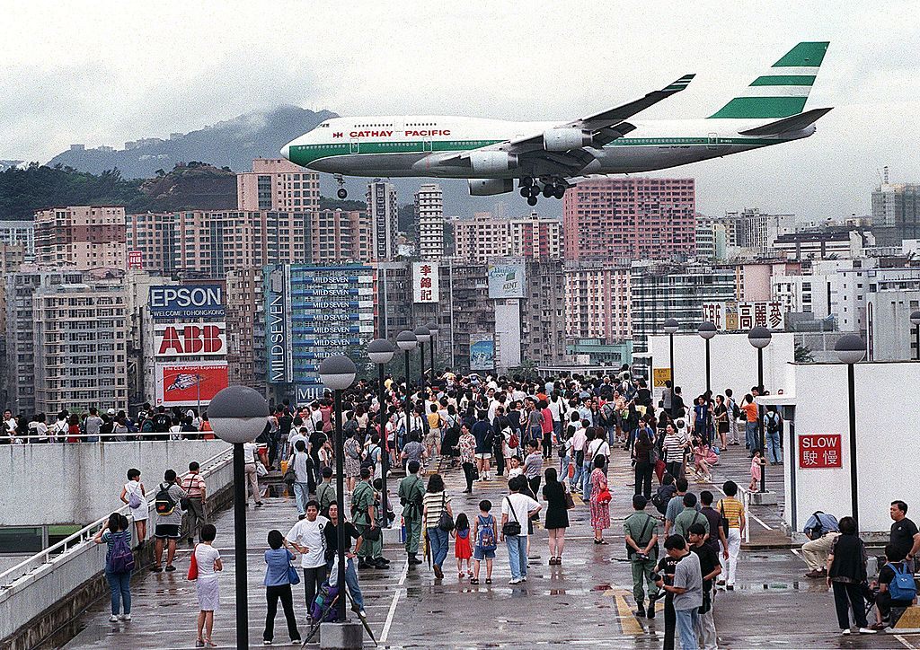 A Cathay Pacific flight comes into land in Hong Kong's Kai Tak Airport, June, 27, 1998. 