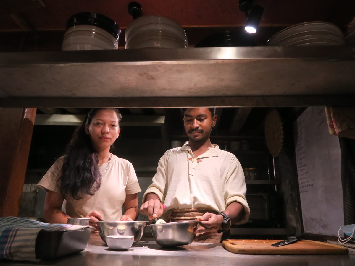 Head cook Barish Gahatraj and assistant cook Sangita Bhujel in the Raithaane kitchen.
