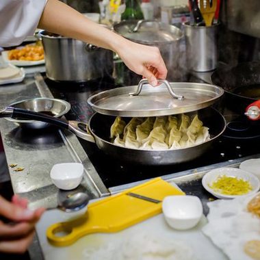 A Japanese nonna makes gyoza at Enoteca Maria.