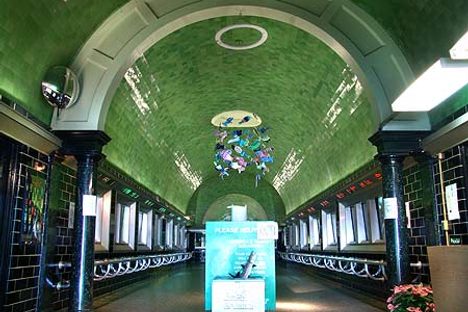 Interior green-tiled vaulted ceiling.