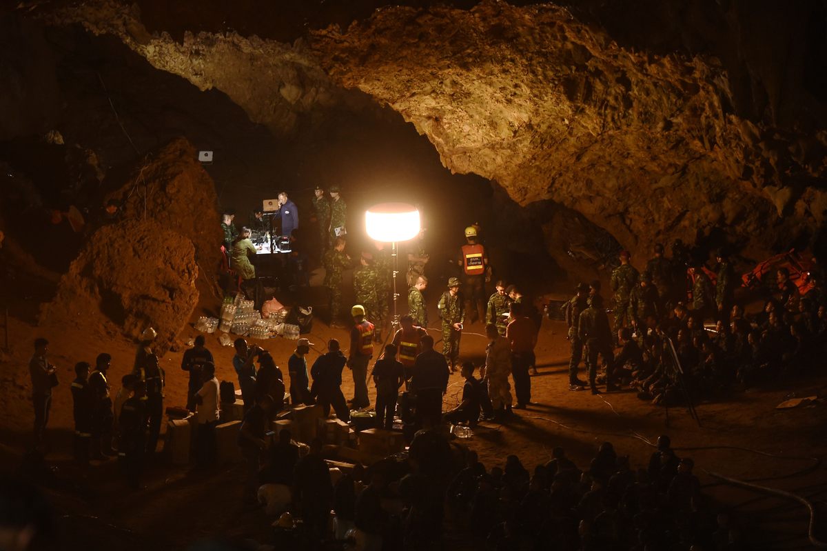 Thai soldiers and locals placed cables and other equipment in the mouth of the cave and adjacent chambers during an early, chaotic phase of the rescue operation.