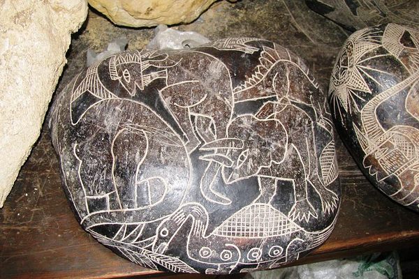 Ica Stone with dinosaurs