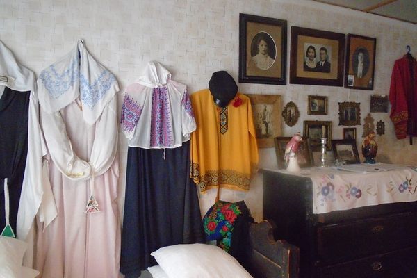 Old photos, traditional clothes displayed at the museum.