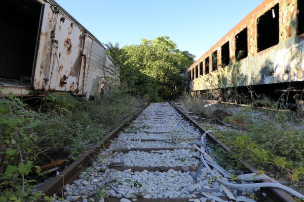 The trains have been rusting away for decades at the cemetery.