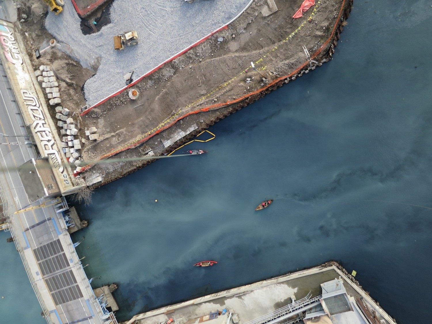 A balloon photo of the Gowanus Canal in Brooklyn, string clearly visible at left.