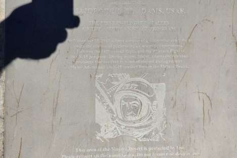 The original plaque at the monument site.
