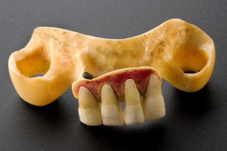 A lower denture from the 1800s made of human teeth and hippopotamus bone.
