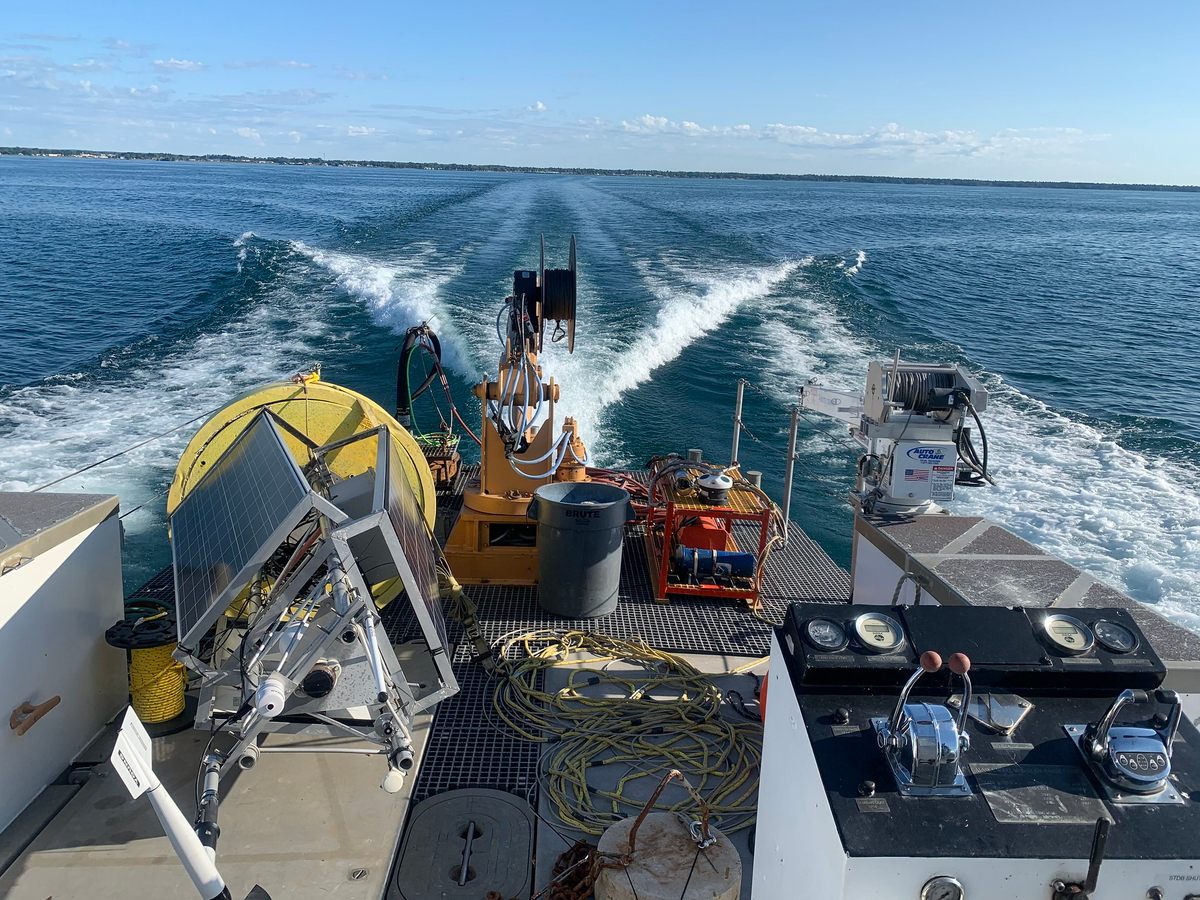 In Lake Huron's Saginaw Bay, a NOAA team deploys buoys that will help provide real-time coastal monitoring, similar to oceanic observation. 