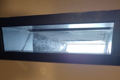 Periscope built into the wall in the men's restroom at Doc's Marina Grill on Bainbridge Island 