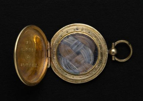 Emily Norcross Dickinson's locket, containing her parents' hair.