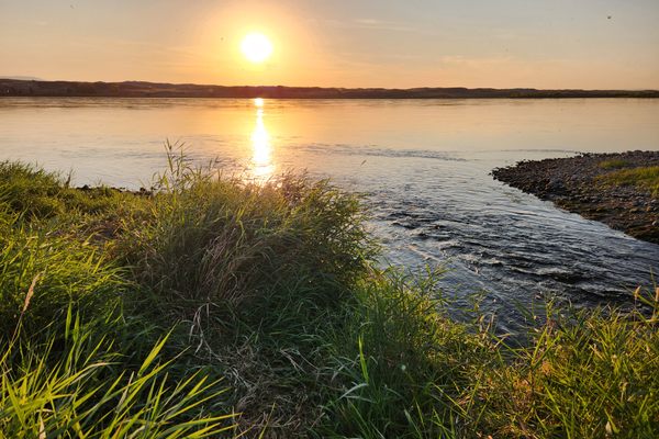 Sunset over the reach, with wasteway in foreground.