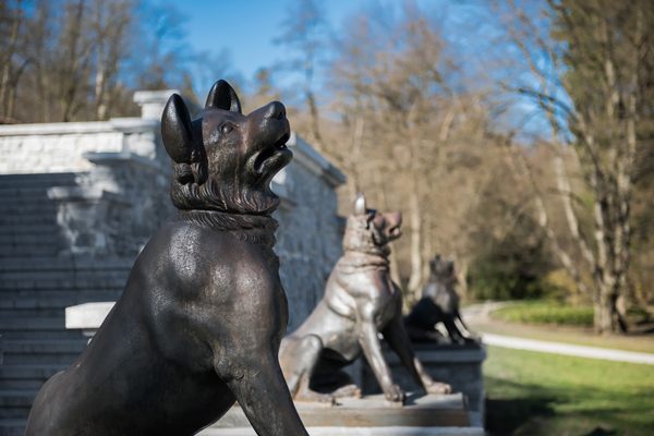 4 cast-iron watchdogs at the foot of Tivoli castle (Ljubljana, Slovenia).