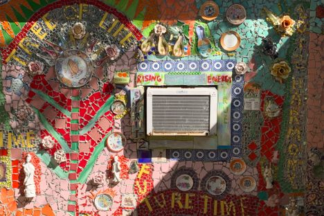 Mosaic along the wall in the back yard