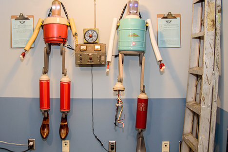 Robots mid-repair.